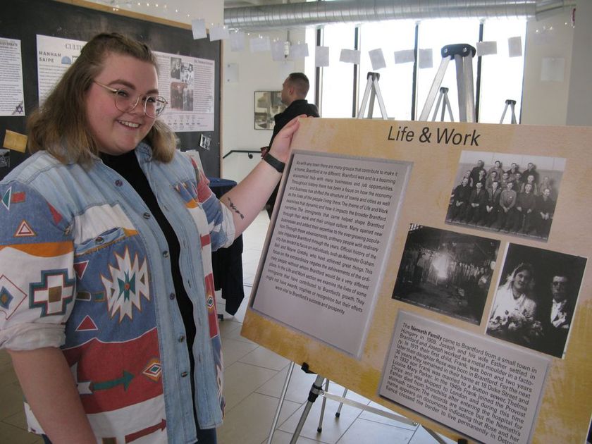 Spotlight story image pertaining to Student presenting poster