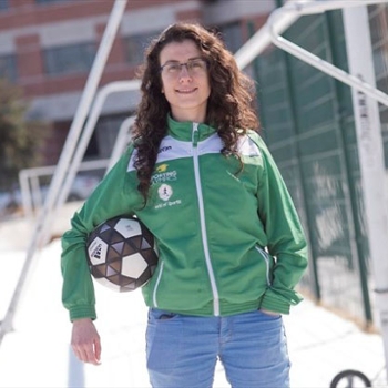 Spotlight story image pertaining to Mary Saleh holding a soccer ball