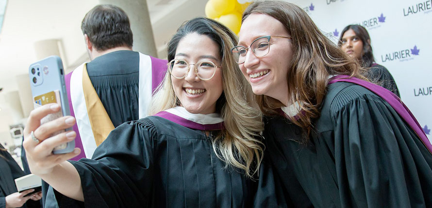 Students walking in front of Research and Academic Centre