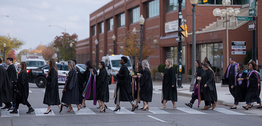 Graduates walking downtown Brantford