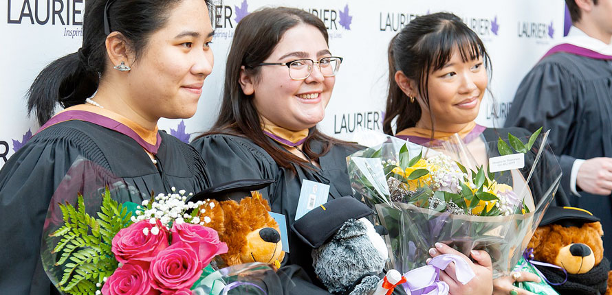 Science graduates taking picture after ceremony