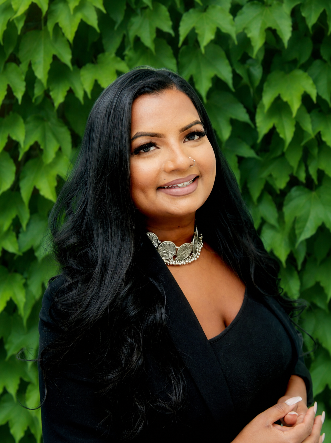 Sinthu's headshot.