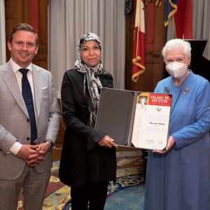 Wilfrid Laurier University PhD candidate Maryam Motia receives her Hilary M. Weston Scholarship from Ontario Lieutenant Governor Elizabeth Dowdeswell and Graham McGregor, parliamentary assistant to Minister of Citizenship and Multiculturalism Michael Ford, during a ceremony at Queen’s Park in September.