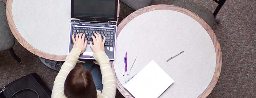 student studying on laptop