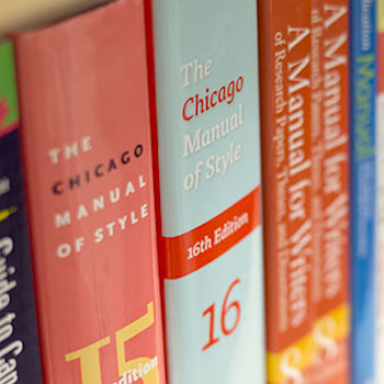 Style guides on bookshelf