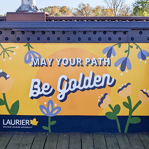 May Your Path Be Golden mural on Gilkison Flats trail.