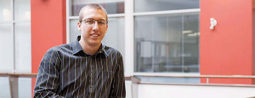 Male MSc student standing