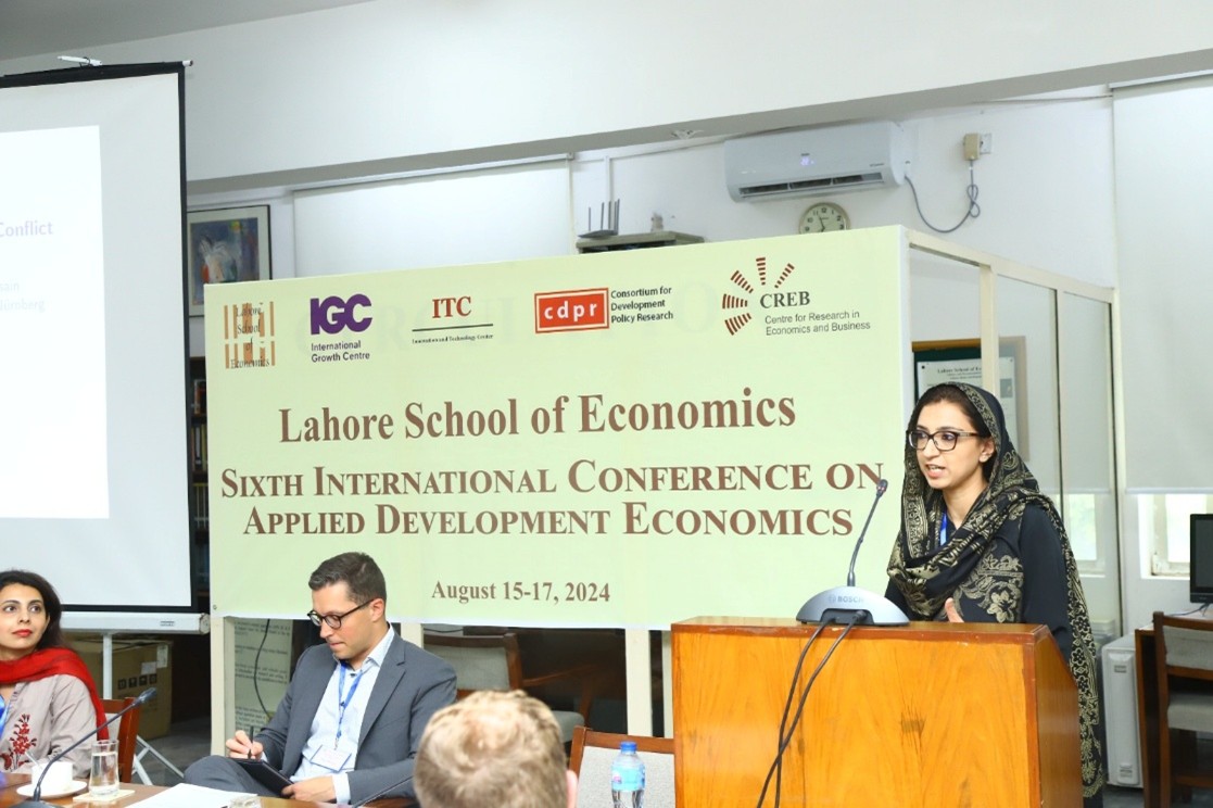 Alt text: Dr. Liaquat presenting her paper “Keeping the Enemies Closer? Exporting Behaviour of Firms Under Conflict” at the Sixth International Conference on Applied Development Economics, August 2024.
