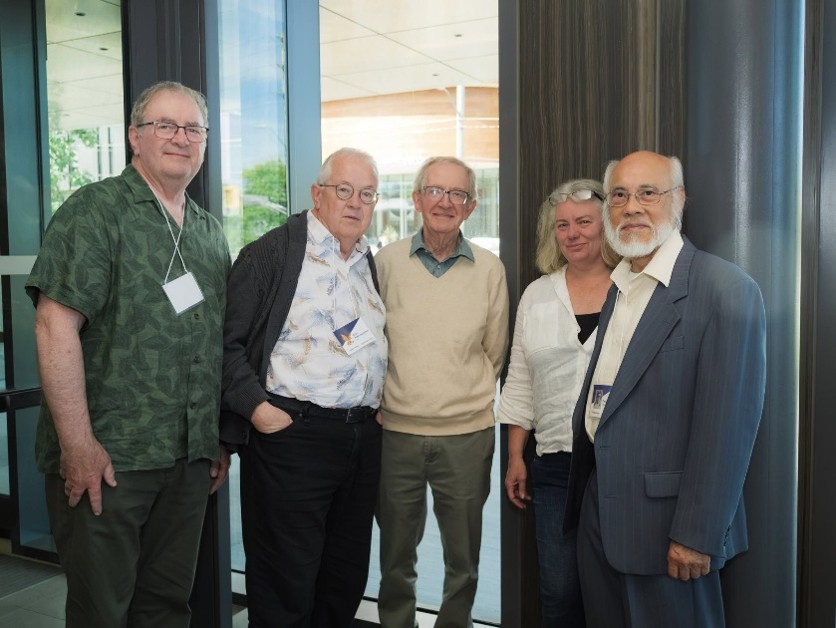 Laurier Economics Alumni Peter Friedmann, Alan Macnaughton and Terence Yhip, with former department chairs Alastair Robertson and Christine Neill