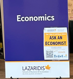 Spotlight story image pertaining to economics-sign