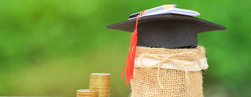 graduation cap with coins