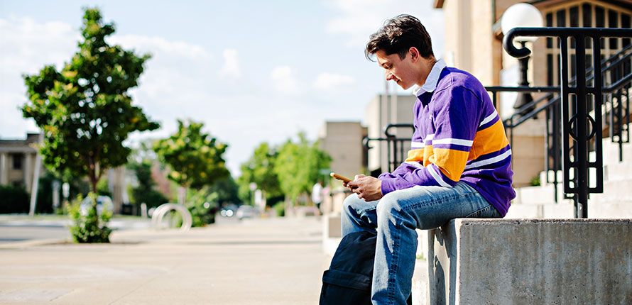 student using phone