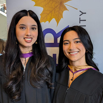 Two students at convocation