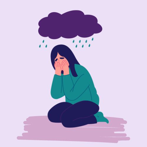 woman sitting crying under a raincloud hanging over her