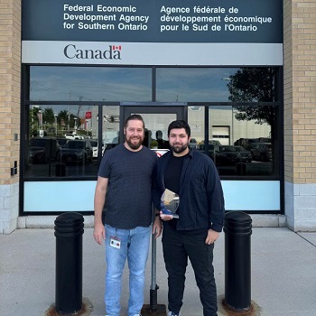 Image of Hilal Safi with team leader Lenny Walker outside of FedDev office.